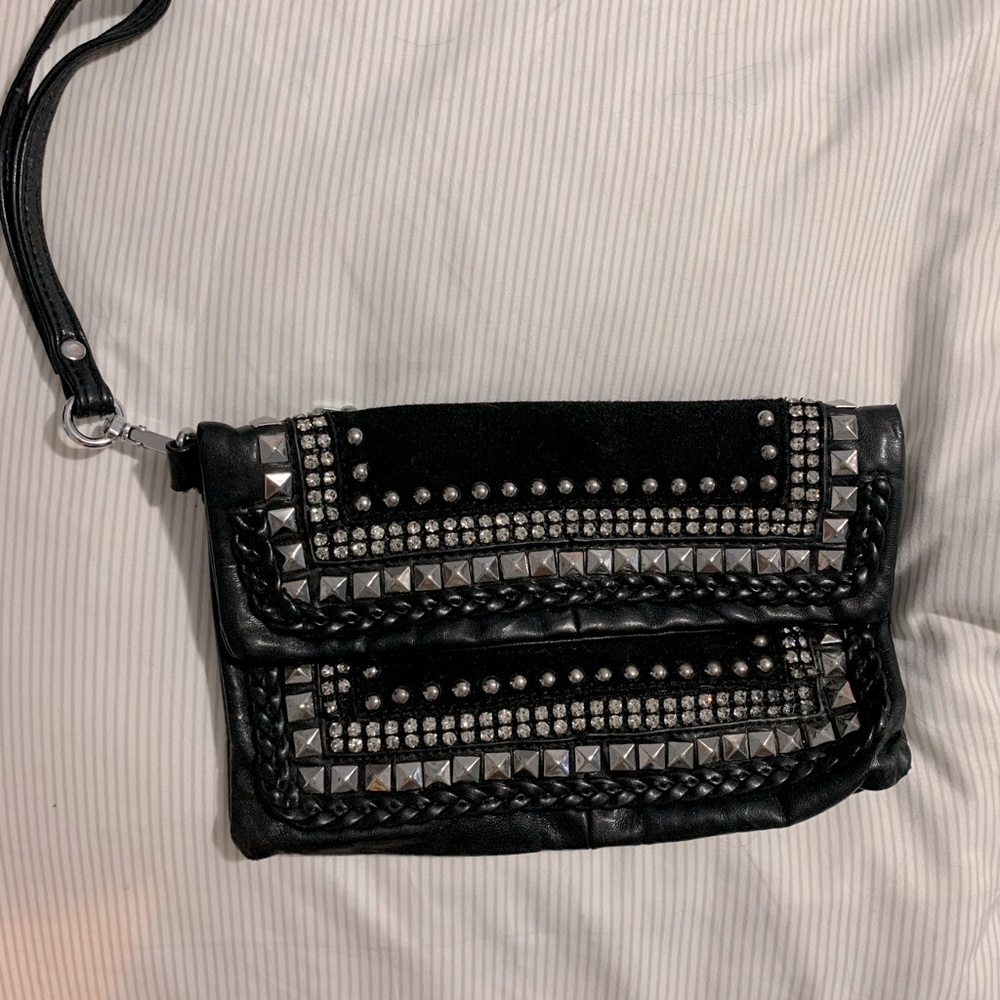 Black leather and suede embellished wristlet from Bebe!